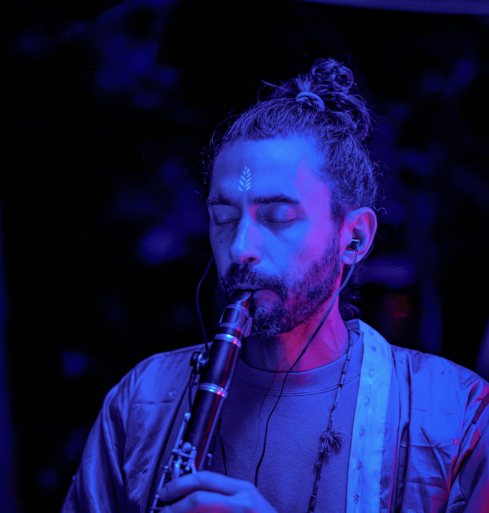 Playing clarinet in blue light at Bagnowianki